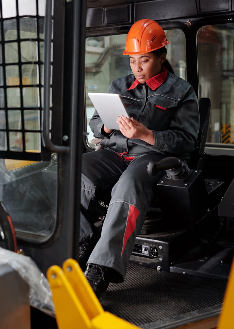 55119-blurred-view-of-worker-using-machinery-in-wa-WVKEHQD