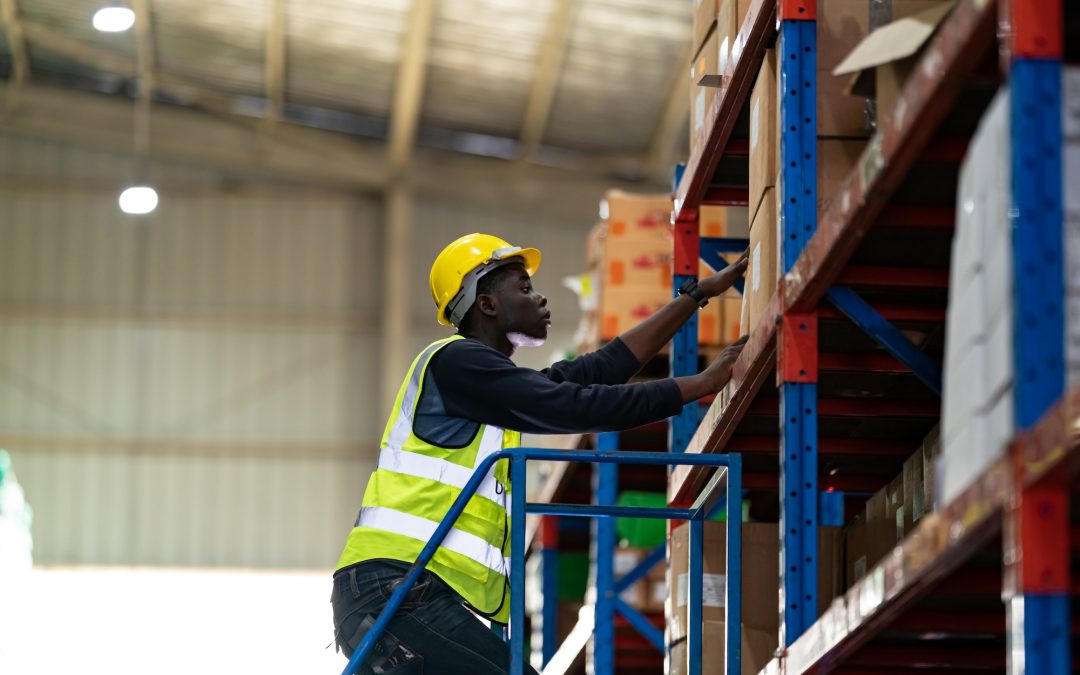 Warehouse workers checking the inventory.