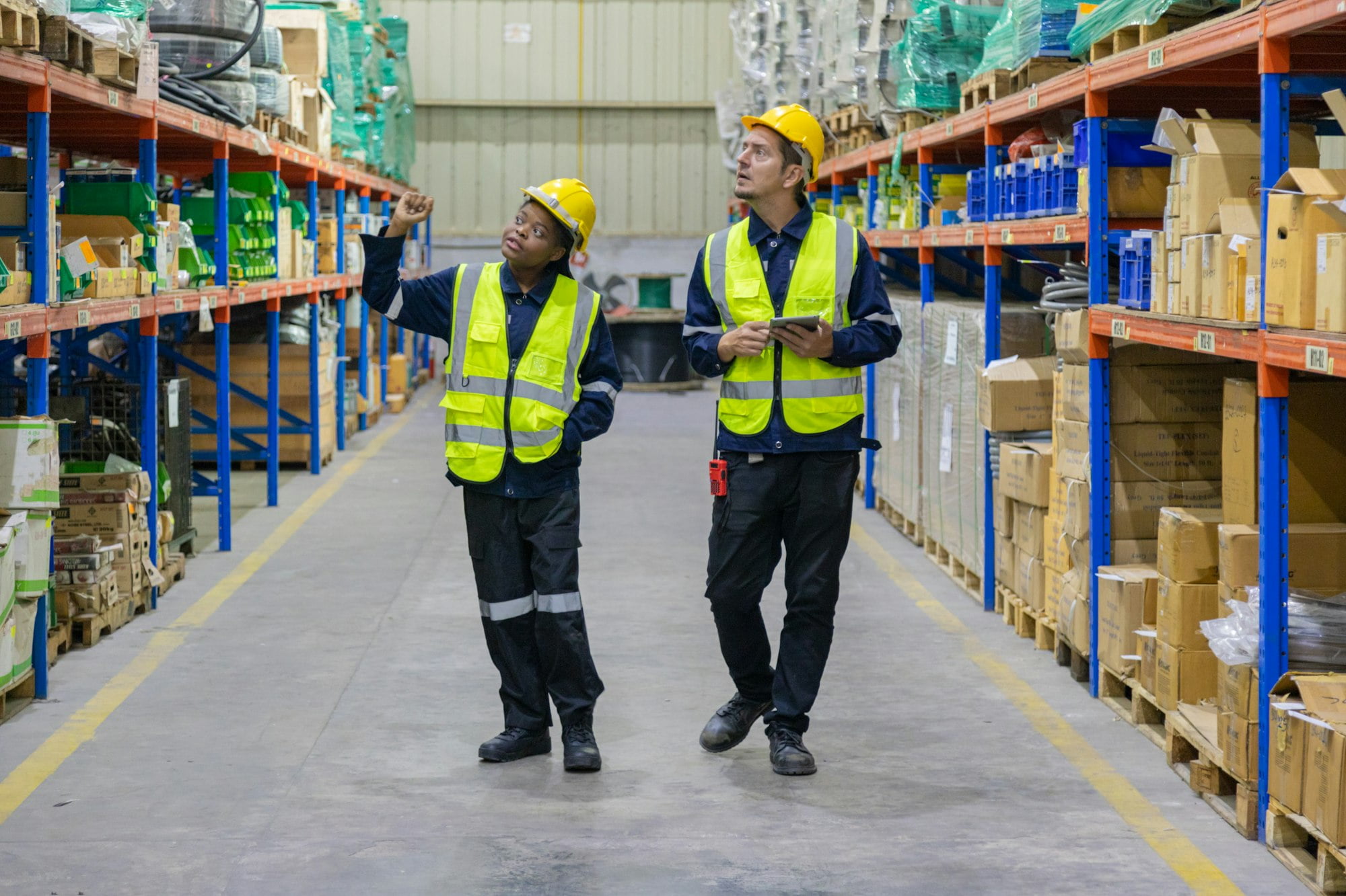 Store clerks inspect products, warehouses, industrial and logistics supply chains.